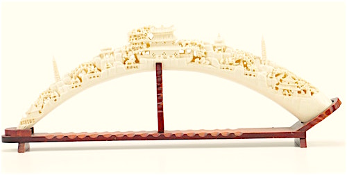 Resin Carved Elephant Tusk with Scene from an Oriental Village on a Stand 