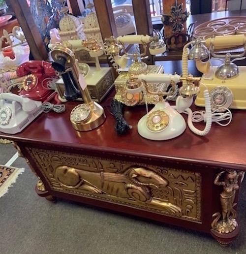 several vintage table phones