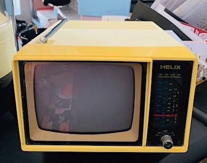  Vintage Small Portable Yellow TV with an AM/FM Radio Dial