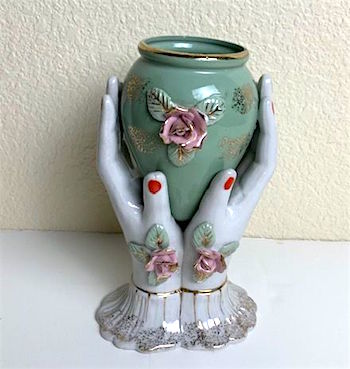 Hands Holding a Small Mint & Floral Vase